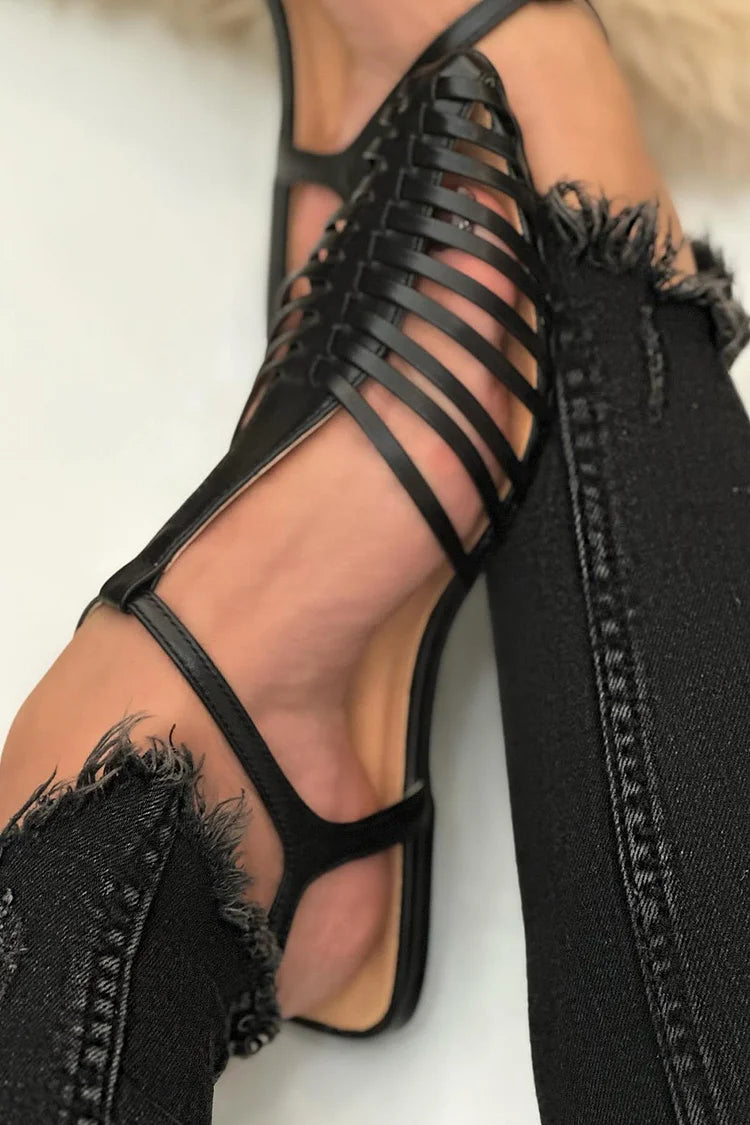 Sandalias cut-out esenciales casual negras de punta con correa en T