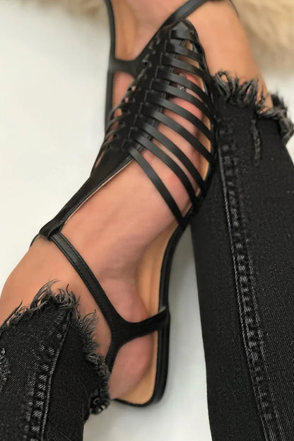 Sandalias cut-out esenciales casual negras de punta con correa en T