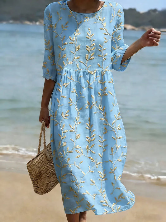Vestido azul bordado con flores vintage