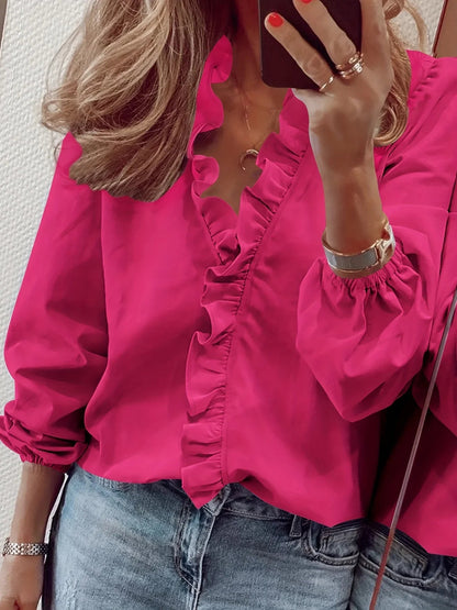 Vittoria · Blusa refinada con volantes