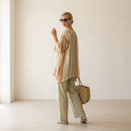 Elisabetta – top asimétrico elegante con pantalones de pierna ancha