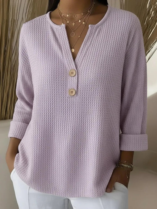 Lucía · Jersey Henley texturizado con botones
