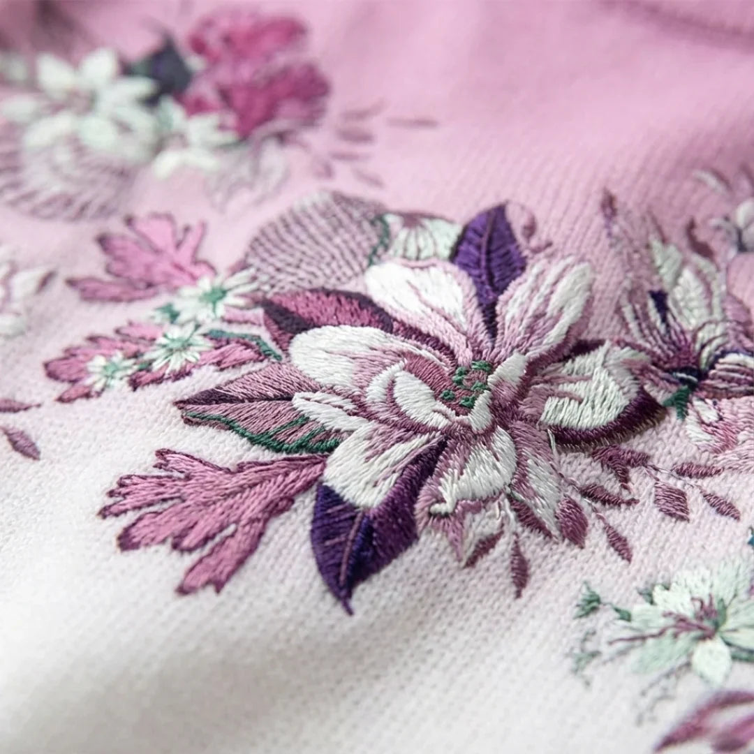 Alba · Jersey floral de cuello alto