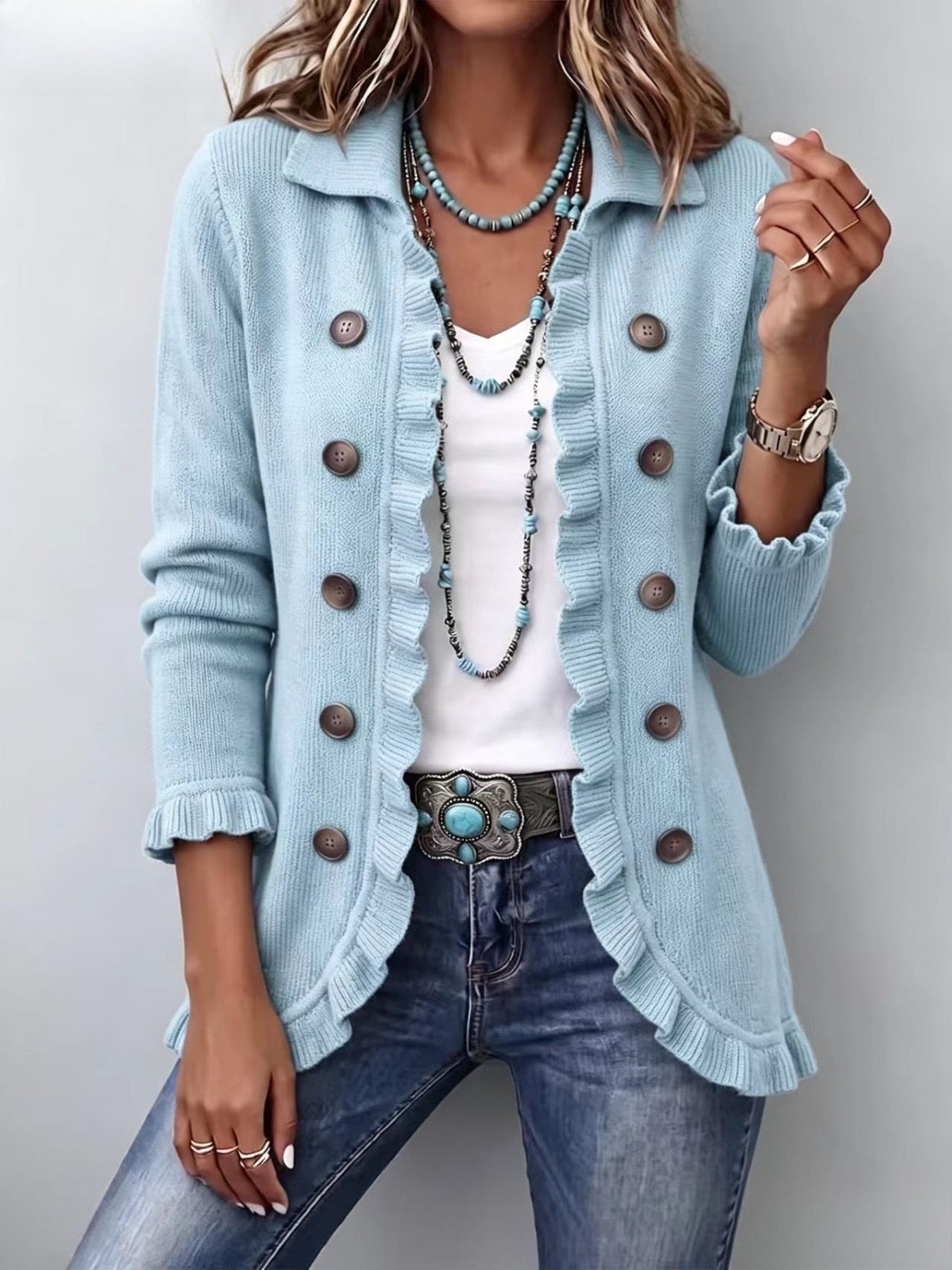 Cecilia · Chaqueta de punto azul empolvado con volantes