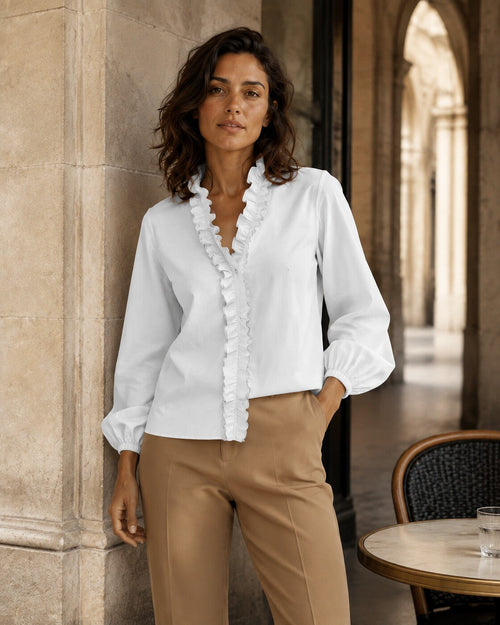 Vittoria · Blusa refinada con volantes